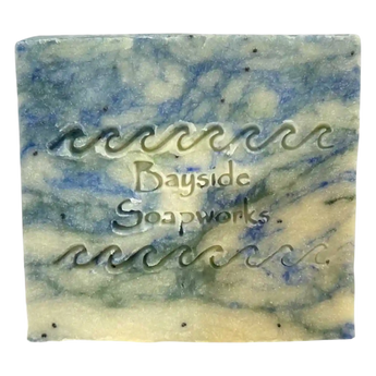 Marbled blue and yellow soap baron a white background