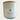 A white glass jar candle with a light wood lid, featuring a white label that reads 'Tidewater Spa Enchanted Escapes' 