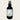 Black spray bottle labeled 'Tiki Treats' by Lantern & Veil on a light gray background