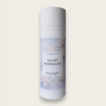 Body powder canister labeled 'Velvet Moonlight' on a light gray background